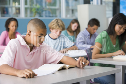 Schoolboy in high school class