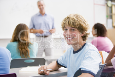 A schoolboy in a high school class