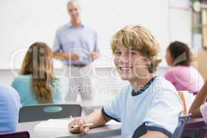 A schoolboy in a high school class