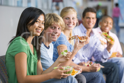 Teenagers enjoying lunch together