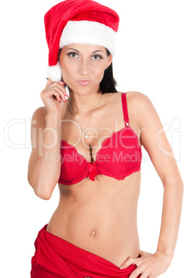 Portrait of beautiful woman in red santa hat