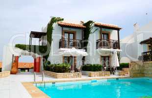 Modern luxury villa with swimming pool at luxury hotel, Crete, G