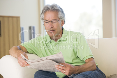 Man relaxing with a newspaper