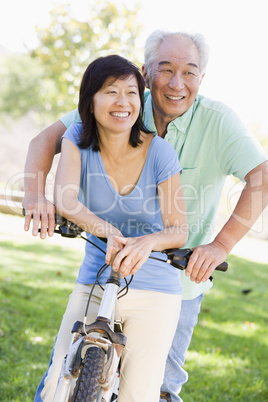 Mature couple bike riding