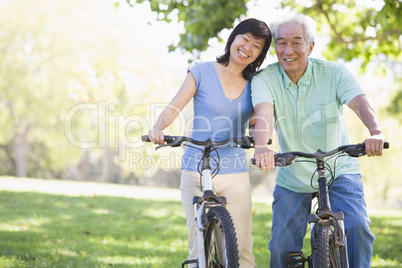Mature couple bike riding.