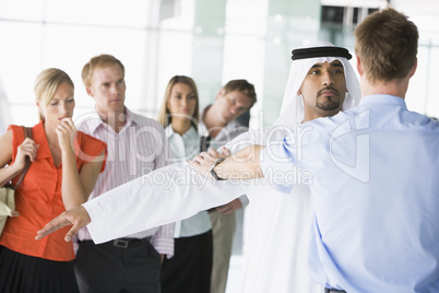 Passengers going through airport security check