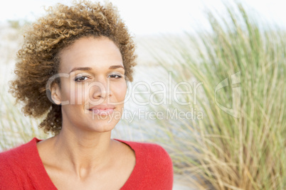 Young woman amongst dunes