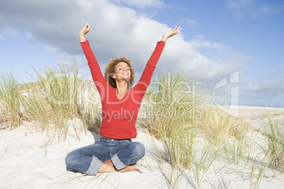 Young woman relaxing on beach