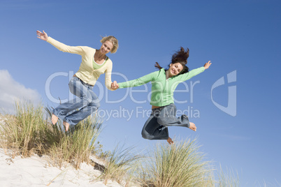 Two young women having fun at beach