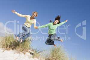 Two young women having fun at beach