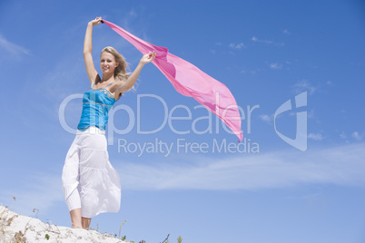 Young woman holding pink wrap