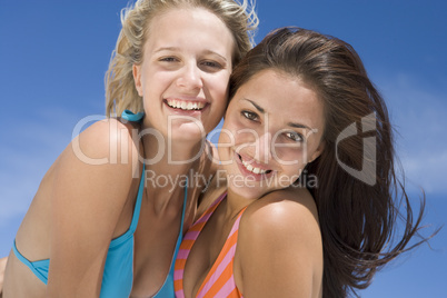 Female friends on beach together