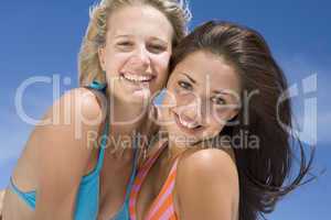 Female friends on beach together
