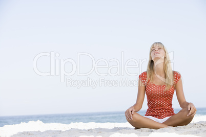 Young woman relaxing on beach