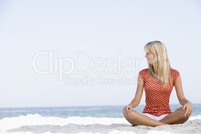 Young woman relaxing on beach