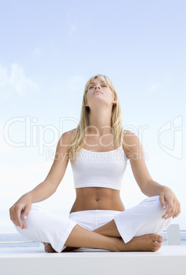 Woman meditating outside