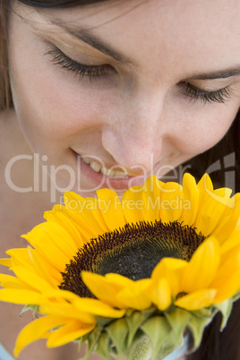 Woman with sunflower