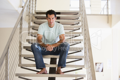 Man sitting on staircase