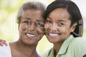 Two women outdoors smiling