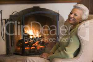 Woman in living room laughing