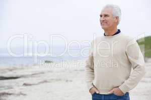 Man at the beach with hands in pockets