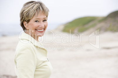 Woman at the beach smiling