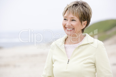 Woman at the beach smiling