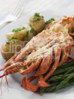 Half a Lobster Thermidor with New Potatoes and Asparagus Spears