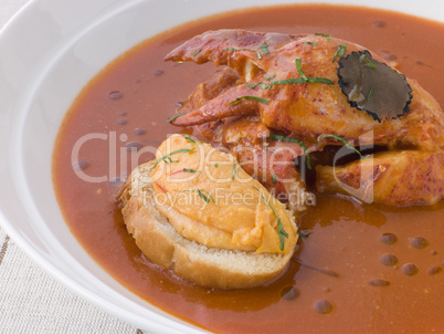 Bowl of Lobster Bisque Rouille Croute and Sliced Truffle