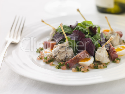 Salad of Frog Legs Lardons and Quail Eggs