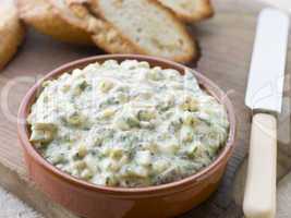 Dish of Sauce Gribiche with Toasted Baguette