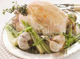40 Clove of Garlic Roasted Chicken with Baby Spring Vegetables