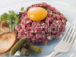 Steak Tartare with Cornichons, Croutons and an Egg Yolk