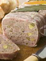Pate Campagne on a Chopping Board with Rustic Bread