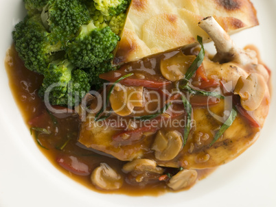 Sauteed Chicken Chasseur with Broccoli and Pomme Anna