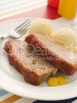 Meatloaf Baked in Tomato sauce with Mashed Potatoes and Mustard