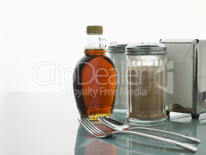 Diner Table with Cutlery and Sauces