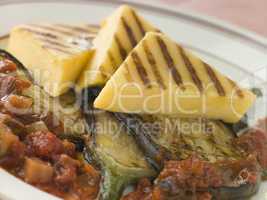 Chargrilled Polenta Cakes with Fried Egg Plant Tomato and Egg Pl