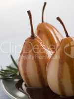 Pear Poached with Rosemary and a Chocolate sauce