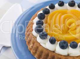 Whipped Cream Peach and Blueberry Sponge Flan