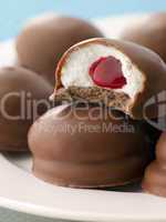 Chocolate and Marshmallow Cakes with Raspberry Jam Centre