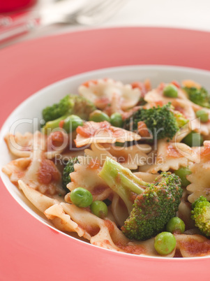Pasta Bows with Tomato Sauce Broccoli and Peas