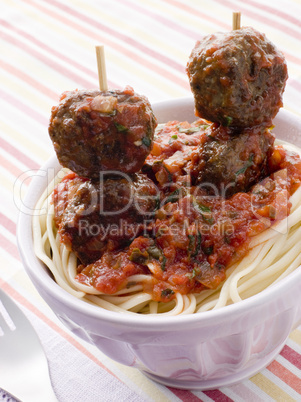 Spaghetti with Meatball Sticks and Spicy Tomato Sauce