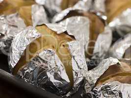 Tray of Jacket Potatoes Wrapped in Foil