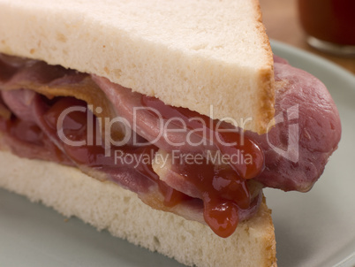 Bacon Sandwich on White Bread with Tomato Ketchup