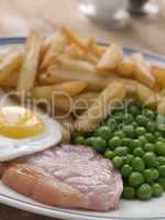 Gammon Steak Fried Egg Peas and Chips