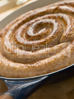 Cumberland Sausage Coil in a Frying Pan