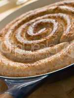 Cumberland Sausage Coil in a Frying Pan
