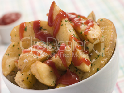 Bowl of Potato Wedges and Tomato Ketchup