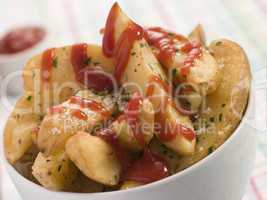 Bowl of Potato Wedges and Tomato Ketchup